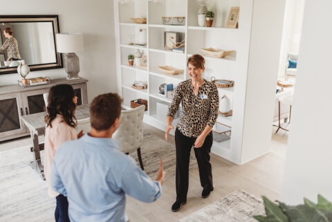 An agent meeting with her clients